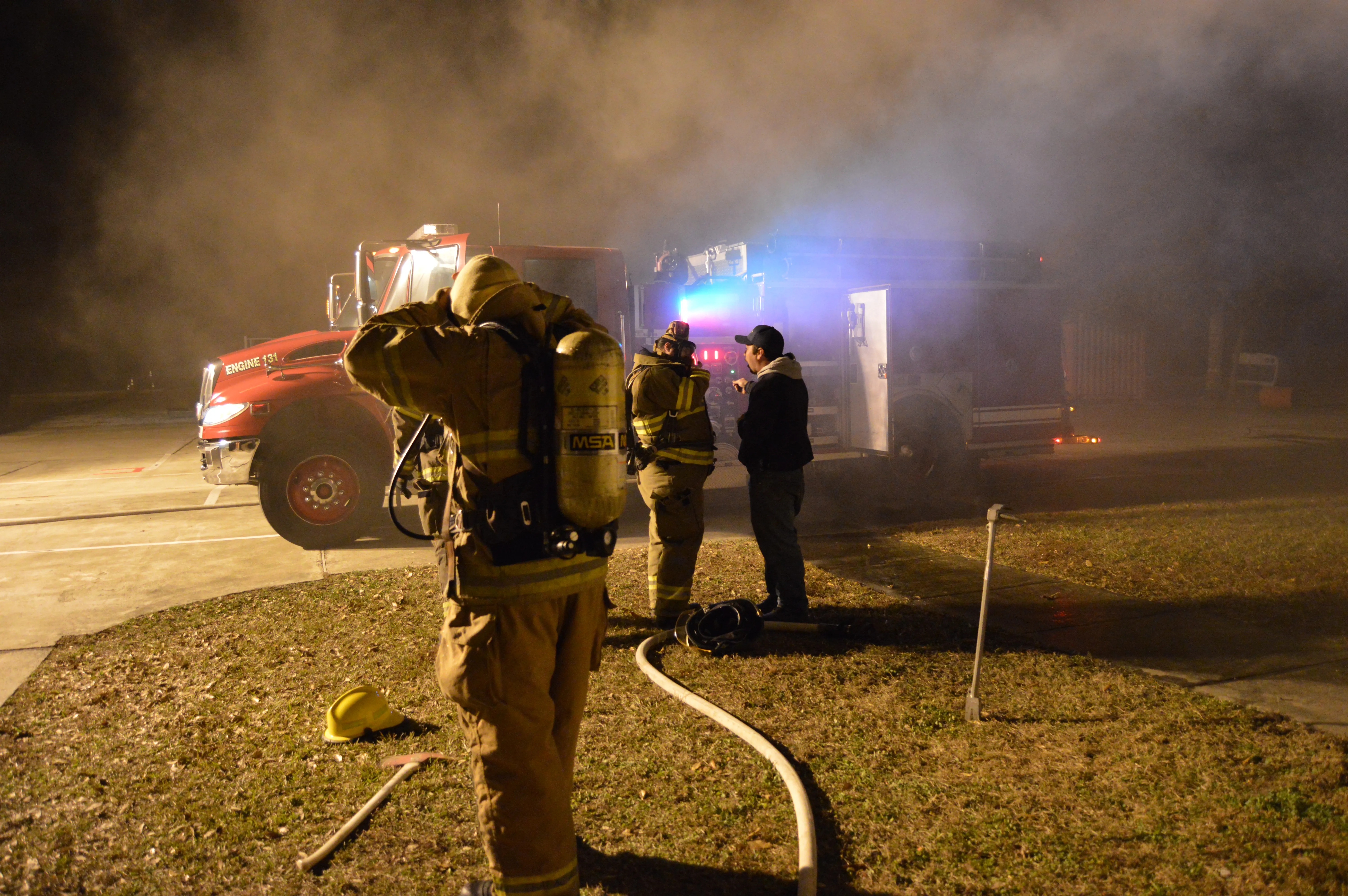 Night scene with Engine 132 and crew